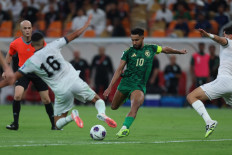 Saudi Arabia's midfielder #10 Salem al-Dawsari attempts a shot during the FIFA World Cup 2026 Asian qualifier football match between Saudi Arabia and Iraq at King Abdullah Sports City in Jeddah on October 14, 2025. 