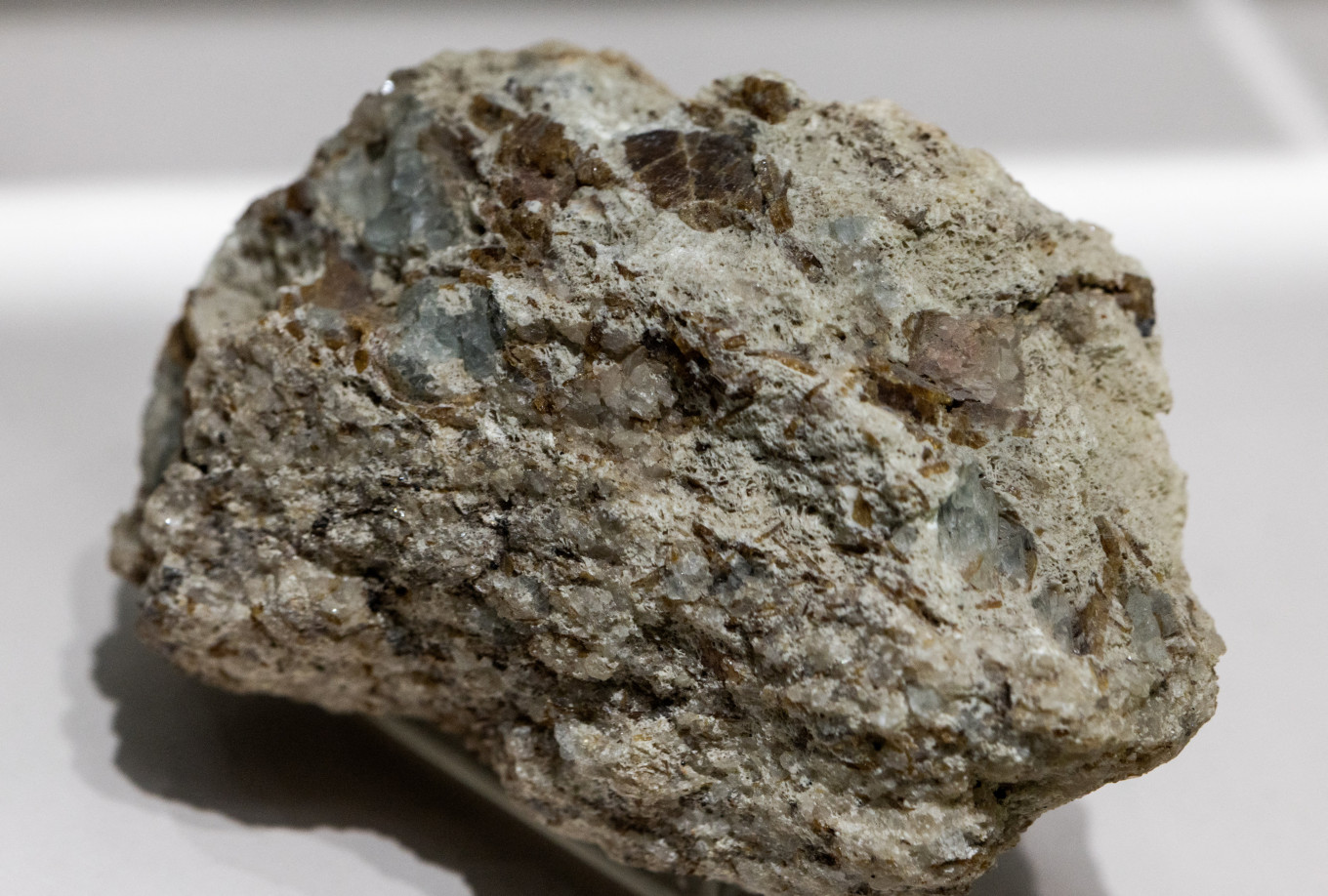 Unassuming appearance: A sample of bastnaesite ore, a mineral used in the rare earth industry to extract elements such as cerium, lanthanum, and neodymium, is displayed at the Geological Museum of China in Beijing on Oct. 14, 2025.