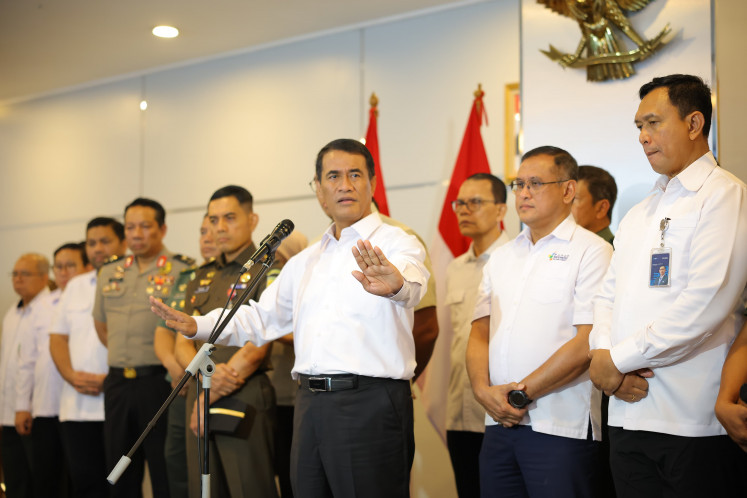 Agriculture Minister Andi Amran Sulaiman is seen on Wednesday during the Agricultural Development Performance press conference at the Agriculture Ministry building in Jakarta.