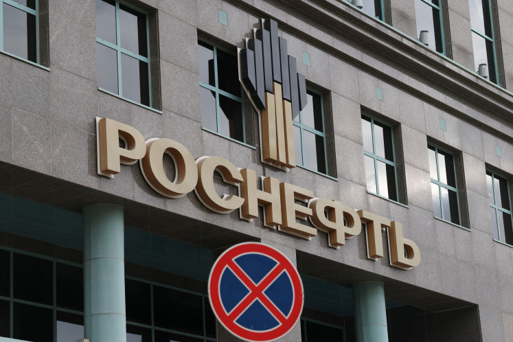 The company's logo adorns the facade of an office building of Rosneft, one of Russia's major oil producers, in Moscow, on Oct. 23, 2025.