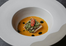 Local flair: Toothfish glazed in lemon sugar, served with ‘belimbing sayur’ (bilimbi) and rice crispies in a broth made from ‘bumbu kuning’ (yellow spice paste), exemplifies the infusion of local ingredients that is one of the hallmarks of August Jakarta. (Courtesy of August Jakarta)