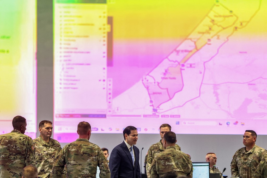 United States Secretary of State Marco Rubio (center) speaks with US military personnel as he visits the Civil-Military Coordination Center in southern Israel on Oct. 24, 2025. US President Donald Trump issued a stark warning to Israel over annexing the West Bank in an interview published on Oct. 23, as visiting Secretary of State Rubio voiced confidence that a US-backed ceasefire in Gaza would hold.