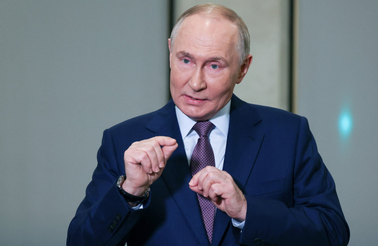 Fresh sanctions: Russian President Vladimir Putin meets with journalists on Thursday to comment on new United States sanctions targeting two major Russian oil producers, as well as other international issues, in Moscow.