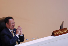 Thailand's Prime Minister Anutin Charnvirakul reacts on the day he delivers the policy statements of the Council of Ministers to the parliament at the parliament house in Bangkok, Thailand, on Sept. 29, 2025.