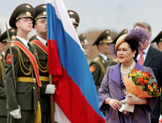 Thailand's Queen Sirikit inspects the honor guard upon her arrival at Vnukovo airport outside Moscow, Russia on July 2, 2007.