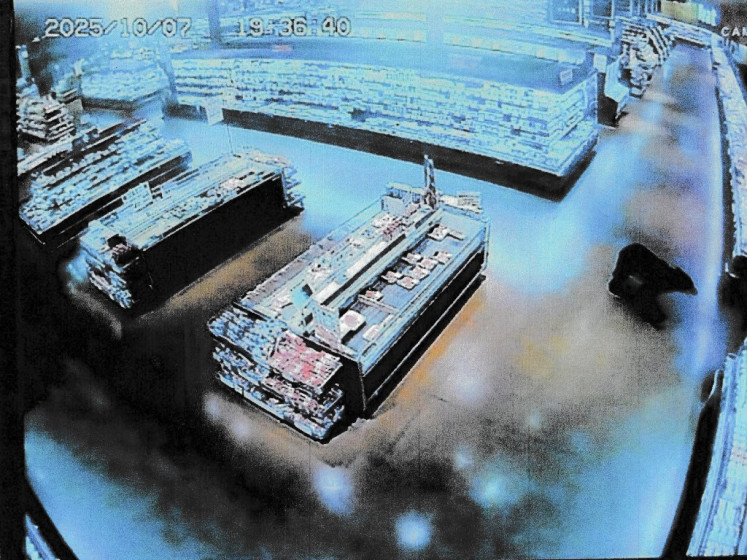 A CCTV camera footage, released by Gunma Prefectural Police via Jiji Press, shows a bear walking inside a supermarket in Numata, Gunma prefecture on Oct. 7, 2025. Bears have killed a record of at least seven people in Japan this year, the highest since 2006 when the survey started, an environment ministry official said Oct. 16.