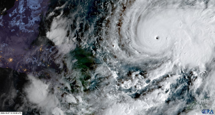 This RAMMB/CIRA handout satellite image shows Hurricane Melissa southeast of Jamaica at 12:10 UTC on October 27, 2025. 