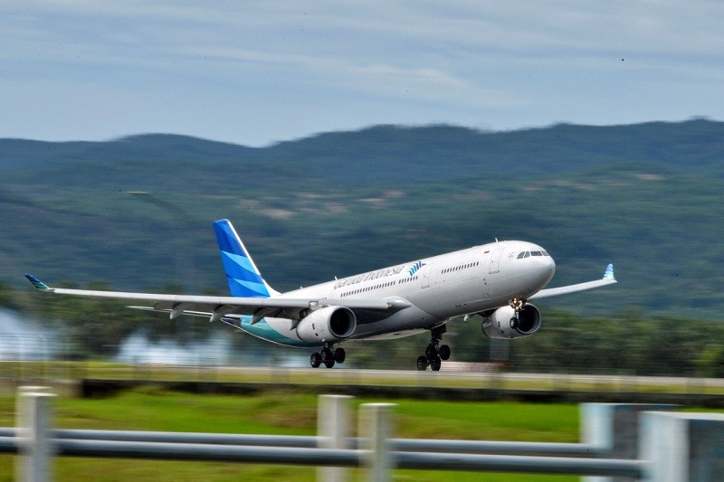 Touching down: A Garuda Indonesia Airbus A330 lands at Sultan Iskandar Muda International Airport in Blang Bintang, Aceh, on July 13, 2021.