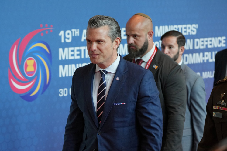 United States Secretary of Defense Pete Hegseth (left) walks to attend a ministerial lunch at the ASEAN Defense Ministers’ Meeting in Kuala Lumpur, Malaysia, on Nov. 1, 2025.