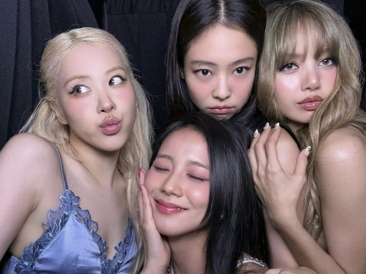 Still going strong: Members of Blackpink (from left) Rose, Jisoo, Jennie and Lisa appear in a group photo posted to Jisoo’s official social media account on Aug. 7, 2025, to mark the K-pop girl band’s ninth debut anniversary.