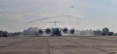 Indonesia's first Airbus A400M receives a customary water salute upon arrival at Halim Perdanakusuma Air Force Base in East Jakarta on Monday.