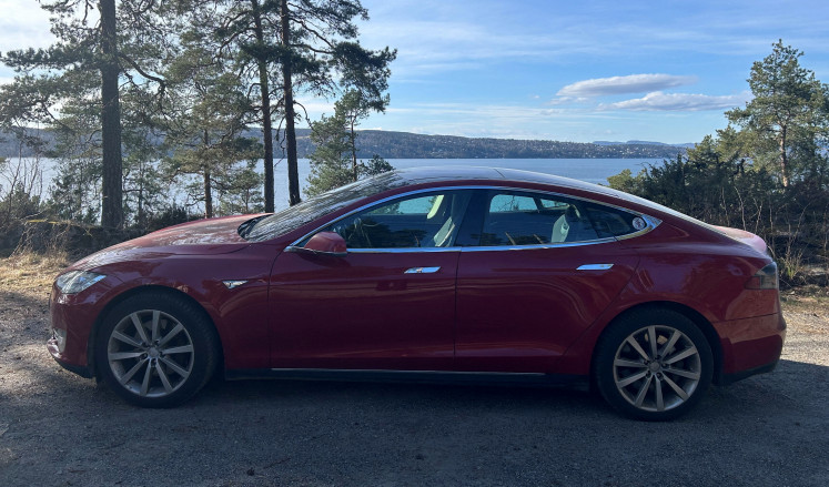 A Tesla Model S is parked in front of Oslofjorden in Oslo on April 9, 2025. 