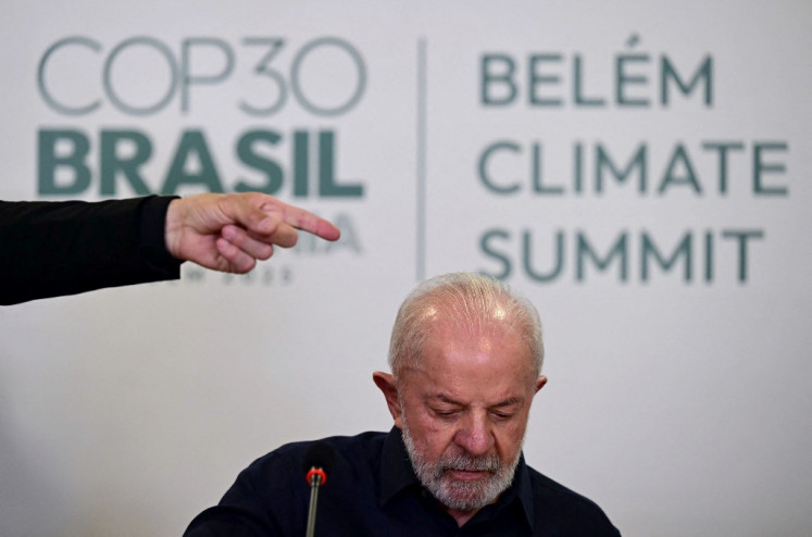 Brazil's President Luiz Inacio Lula da Silva arrives for a briefing with foreign media on Nov. 4 ahead of the COP30 UN Climate Change Conference in Belem, Para state, Brazil.