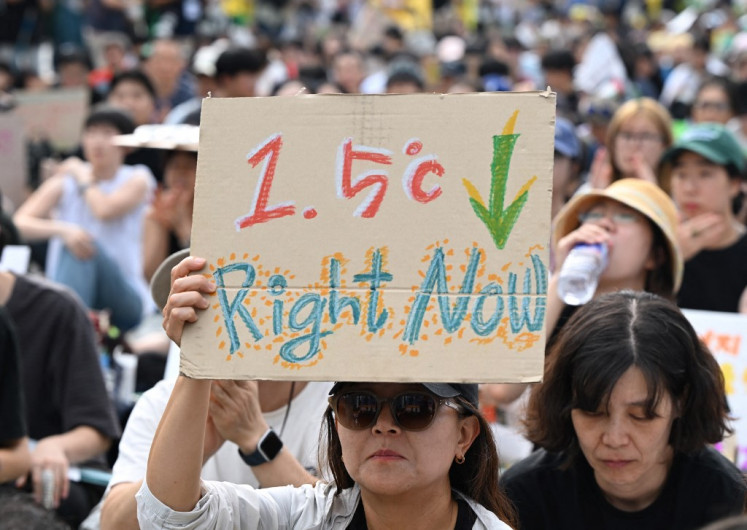 Protesters participate in a rally on Sept. 27 for Climate Justice in Seoul.