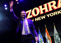 The Democratic candidate for New York City mayor in the United States, Zohran Mamdani, waves on stage on election night, Nov. 4, 2025, in Brooklyn after winning the 2025 race. 