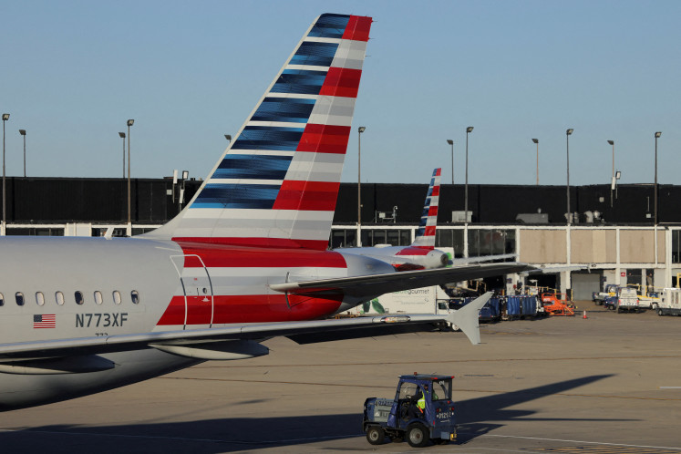 A plane sits at O'Hare International Airport as the US government shutdown continues, in Chicago, Illinois, US, on Oct. 26, 2025.