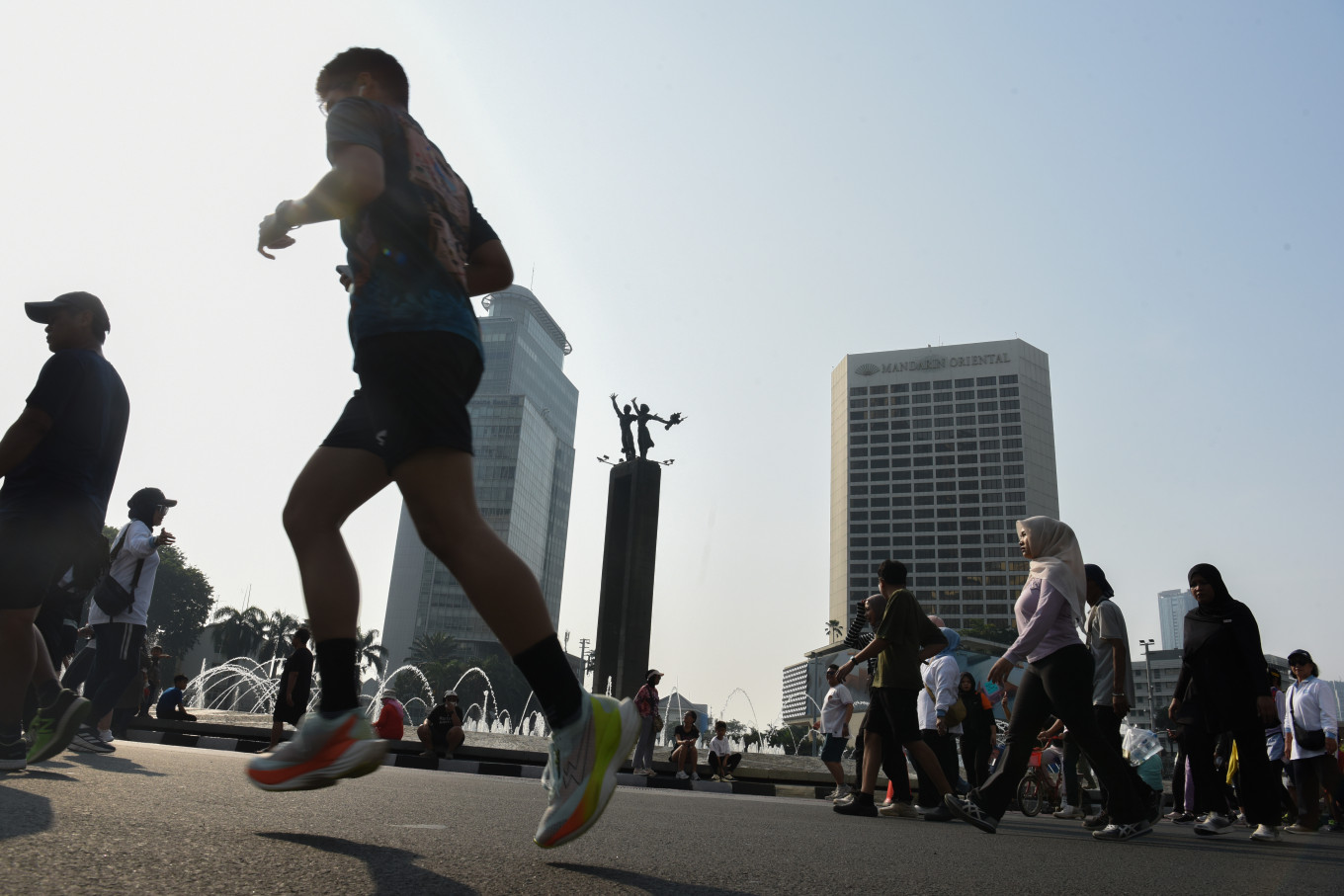 Residents exercise during Car Free Day on Oct. 12 at the Bundaran Hotel Indonesia in Jakarta.