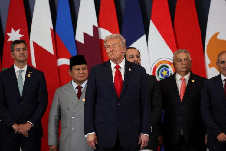 President Prabowo Subianto (second left) stands among other world leaders (from left) Paraguayan President Santiago Peña, United States President Donald Trump Cypriot President Nikos Christodoulides and Hungarian Prime Minister Viktor Orbán as they gather for a photo op on Oct. 13 during the 2025 Gaza Peace Summit, also known as the Sharm el-Sheikh summit after the Egyptian city that hosted the event.