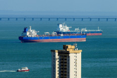 Greece-flagged oil tanker Minerva Astra, chartered by US company Chevron, sits offshore the port of Bajo Grande on Sept. 22, in Maracaibo, Venezuela.
