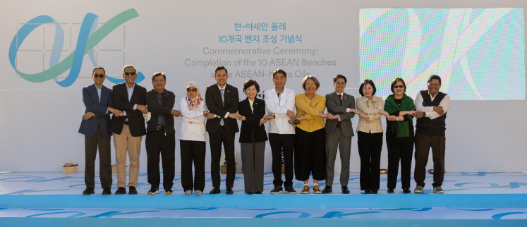 ASEAN-Korea Centre secretary-general Kim Jae-shin (sixth right) poses for a group photo with ASEAN Ambassadors in Korea, Jeju’s Deputy Governor for Political Affairs Kim Ae-sook (sixth left) and Jeju Olle Foundation CEO Ahn Eun-joo (fifth right) during the launching ceremony at Parnas at Parnas Hotel Jeju in Jeju, South Korea on Nov. 11, 2025.