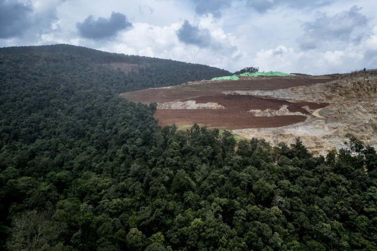 A nickel mining site at the edge of the forest is seen in April 15. Members of the Hongana Manyawa indigenous tribe regularly patrol the area to monitor mining activity in East Halmahera, North Maluku.