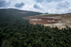 A nickel mining site at the edge of the forest is seen in April 15. Members of the Hongana Manyawa indigenous tribe regularly patrol the area to monitor mining activity in East Halmahera, North Maluku.