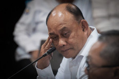 Dadan Hindayana, the head of the National Nutrition Agency (BGN), reacts as ministers, agency representatives, and stakeholders attend a coordination meeting on the implementation of the Free Nutritious Meal Program (MBG) at the Coordinating Ministry for Food in Jakarta on March 3, 2025. 