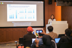 Google Indonesia Country Director Veronica Utami speaks in a media briefing on Thursday, on the e-Conomy Southeast Asia report. The annual report has been published by tech giant Google, Singapore-based Temasek and the United States-based research firm Bain & Company.
