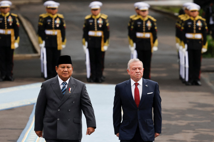 President Prabowo Subianto, with Jordan's King Abdullah II, inspect the honour guards during a welcoming ceremony upon their meeting at the Merdeka Palace in Jakarta, November 14, 2025. 
