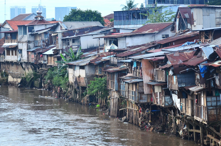 Low-income housing is seen in this photo taken on Nov. 13 on the banks of the Ciliwung River in Matraman, East Jakarta.