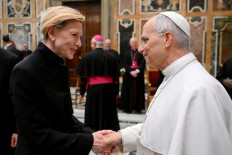 Pope Leo XIV (right) meets with actor Cate Blanchett during an audience with artists from the world of cinema in the Sala Clementina at the Vatican, on Nov. 15, 2025.
