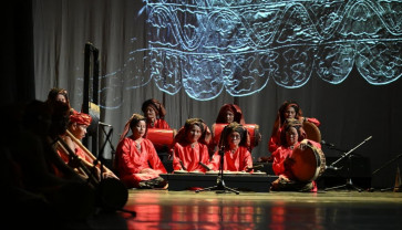 Sacred rhythms: The Gondang Baroguang group from Mapat Tunggul, Pasaman, Nagari Lubuak Gadang performs before a full-house audience on Oct. 29, 2025, at the Sunken Area of the National Museum in Central Jakarta. Asmar, 87, one of the maestros who plays gendang (double-headed drums), sat at the back on the far left.