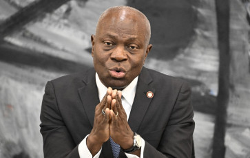 International Labour Organization (ILO) Director-General Gilbert Houngbo speaks during a press conference after a meeting of the heads of international financial and economic organizations in Berlin on Nov. 29, 2022.