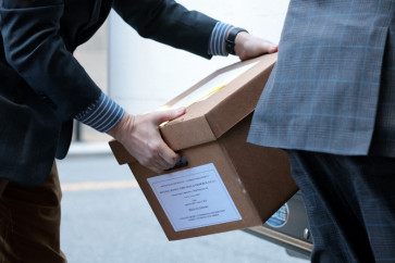 A box labeled “Federal Trade Commission v. Meta Platforms, Inc.“ is being loaded into a vehicle outside the E. Barrett Prettyman United States Court House on April 16, 2025, in Washington, DC, for a US Federal Trade Commission antitrust trial against Meta over the company's acquisitions of Instagram and WhatsApp.