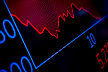 A screen tracks trading on the floor at the New York Stock Exchange (NYSE) after the closing bell in New York City, US, on April 4, 2025.