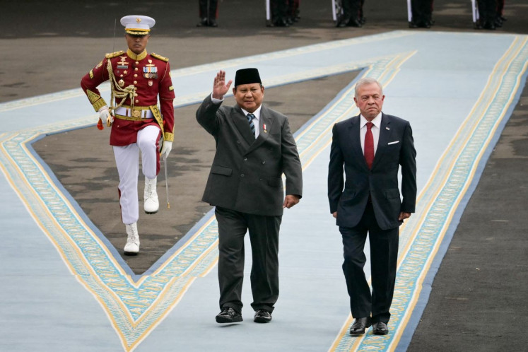 Old friends: President Prabowo Subianto (center) and Jordan’s King Abdullah II inspect an honor guard on Nov. 14, 2025 at the presidential palace in Jakarta.
