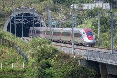 Daylight express: A Whoosh high-speed train passes through the Ngamprah tunnel in West Bandung regency, West Java, on July 31, 2025.