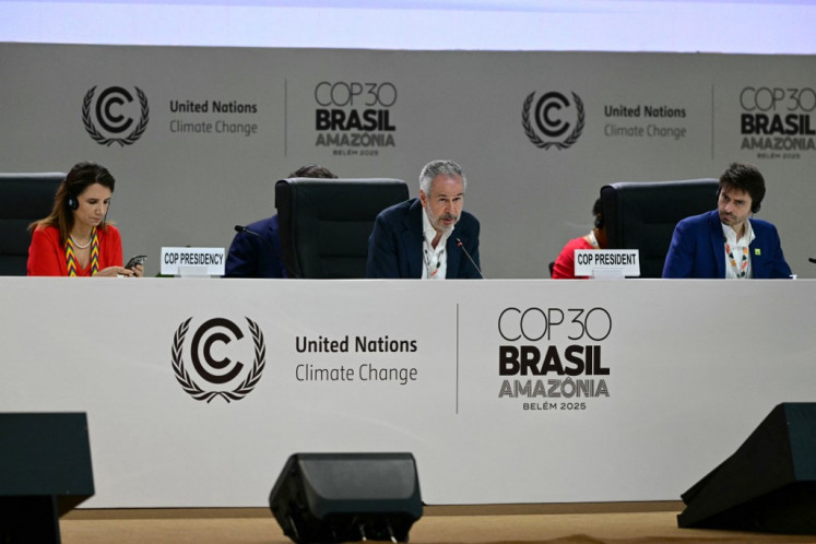 COP30 President Andre Correa do Lago (center) speaks during a plenary session of the COP30 United Nations Climate Change Conference in Belém, Para state, Brazil on Nov. 21, 2025. Colombia said Friday that the UN climate talks “cannot end“ without a roadmap for the global phaseout of fossil fuels after it was omitted from the latest draft agreement unveiled by COP30 host Brazil.
