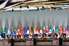 Leaders attend a plenary session on the opening day of the Group of 20 (G20) leaders' summit at the Nasrec Expo Centre in Johannesburg, South Africa, on Nov. 22, 2025.