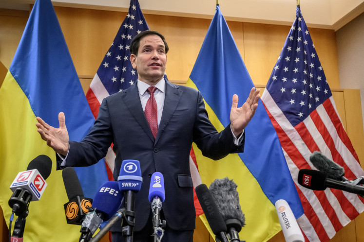 Reassuring allies: United States Secretary of State Marco Rubio gestures during a press conference on Sunday, Nov. 23, at the US Mission to International Organizations in Geneva, Switzerland, after closed-door talks on a US plan to end the war in Ukraine.