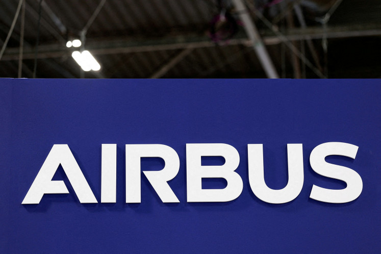 The Airbus logo is displayed at the Parc des Expositions de Paris-Nord-Villepinte exhibition centre in Villepinte, near Paris, France, on Nov. 18, 2025.