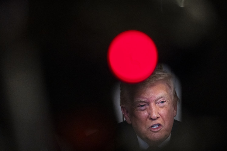 Toughen up: United States President Donald Trump participates in a call with US service members on Thursday, Nov. 27, Thanksgiving Day, from his Mar-a-Lago club in Palm Beach, Florida, the US.