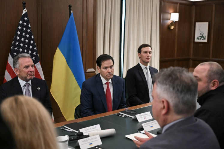 (Left/right) White House Special Envoy Steve Witkoff, US Secretary of State Marco Rubio, and Jared Kushner listen as Rustem Umerov (right) speaks while leading Ukrainian delegation during a meeting in Hallandale Beach, Florida on November 30, 2025. 