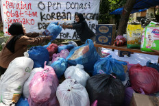 University students in Banda Aceh, Aceh, gather humanitarian aid for survivors of the northern Sumatra floods and landslides on Dec. 4, 2025. 