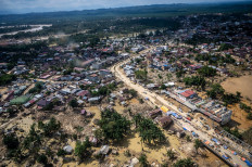 Floodwaters cover a major road and surrounding areas in Aceh Tamiang regency in Aceh on Dec. 4, 2025, a little over a week after Tropical Cyclone Senyar made landfall in northern Sumatra, triggering floods and landslides that have affected around 1.5 million people across 3,310 villages in the province, according to official figures.