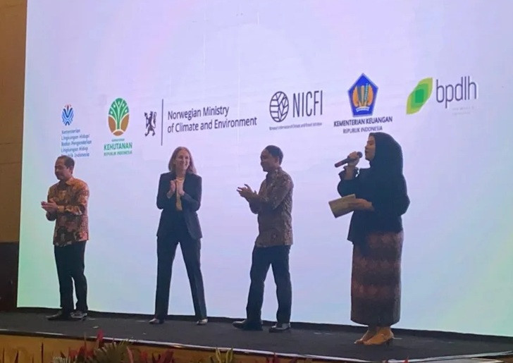 Environment Minister Hanif Faisol Nurofiq (left), Norwegian Ambassador to Indonesia Rut Kruger Giverin (second left) and Forestry Minister Raja Juli Antoni (second right) attend the launch of the fourth phase of a Result-Based Contribution funding cooperation on Dec. 10, 2024, in Jakarta.