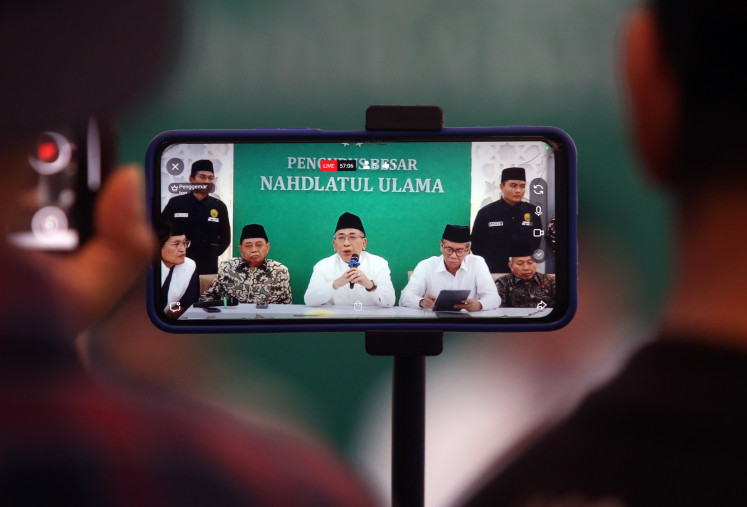 Indonesia&rsquo;s largest Islamic organization Nahdlatul Ulama (NU) chairman Yahya Cholil Staquf (center), accompanied by the organization&rsquo;s deputy chairman Masyhuri Malik (second left) and secretary-general Amin Said Husni (second right), gives a press statement on Dec. 3, 2025, regarding the refusal to step down as chairman in Jakarta.