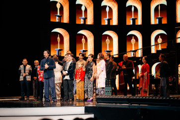 Starry celebration: Reza Rahadian (front), director and cowriter of Pangku (On Your Lap), a drama movie that scooped up four Citra Awards including for Best Film and Best Original Screenplay, delivers an acceptance speech at the award ceremony on Nov. 20, during the Indonesian Film Festival (FFI) 2025 at Teater Jakarta in the cultural compound in Menteng, Central Jakarta.