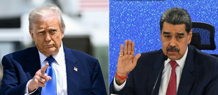 This combination of file pictures created on September 20, 2025 shows US President Donald Trump (left) gesturing as he walks to board Air Force One at Joint Base Andrews in Maryland on May 12, 2025; and Venezuela's President Nicolas Maduro speaking during a press conference with international media at Hotel Eurobuilding in Caracas on September 15, 2025. 