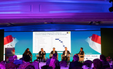 PT PLN business and corporate development executive vice president Abdan Hanif Satria (center) outlines the company&rsquo;s plans to boost renewable energy investment as Global Renewables Alliance head of corporate sourcing Trigya Singh, Indonesia Energy Transition Implementation Joint Office executive chairperson Edo Mahendra, HDF Energy Asia-Pacific executive director Mathieu Geze, and Tenggara Strategics executive director Riyadi Suparno (left to right) look on during the Indonesia Investment Forum in London on Nov. 18.